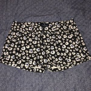 american eagle black shorts with flower designs